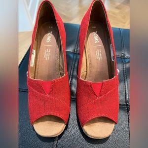 Worn once red Tom’s Wedge heels- 8W but don’t feel wide at all.
